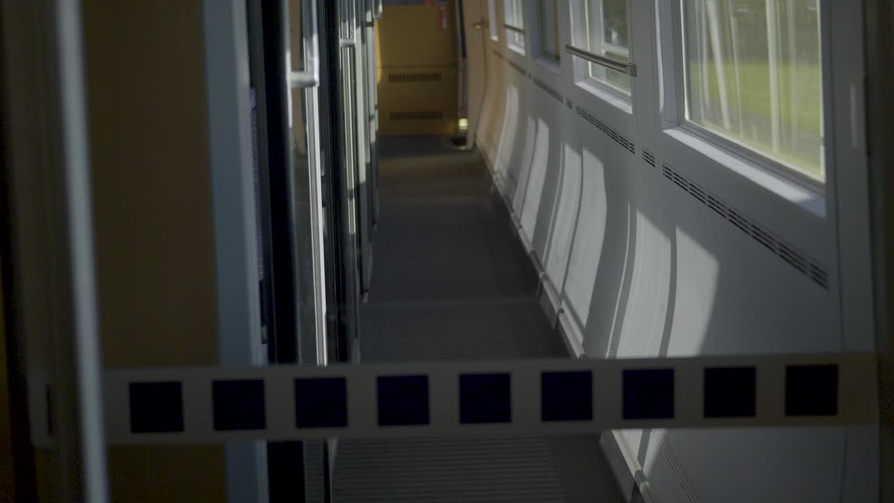 Inside an ICE high-speed train, a view of the corridor with a blocked-off section