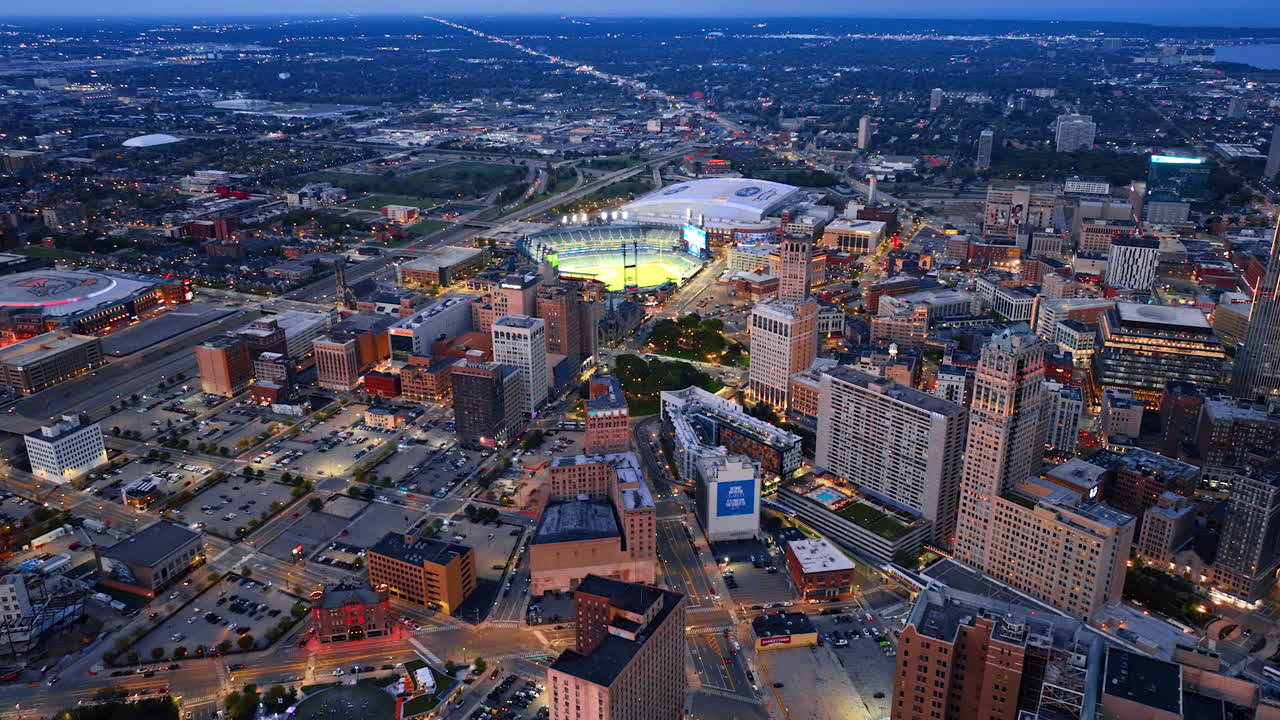 Detroit, USA, 28 July 2025: Panorama of Detroit, Michigan, USA at dusk time. Drone footage approaching the stadium and sport arena in the city downtown