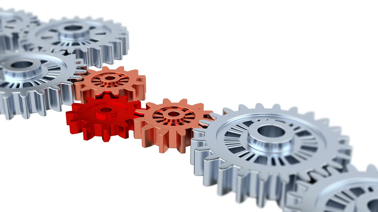 размытые серебряные шестерни с одним красным поворотом в середине