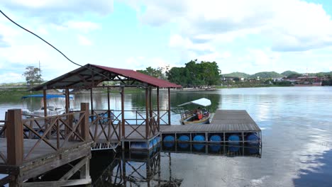 harbor in flores, a small island in the middle of a lake in guatemala