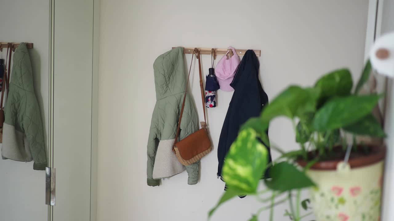 Coats and Accessories on a Coat Rack