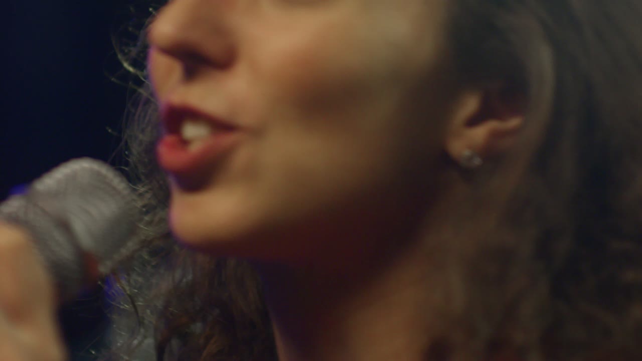 Young Woman Singing Upbeat Song