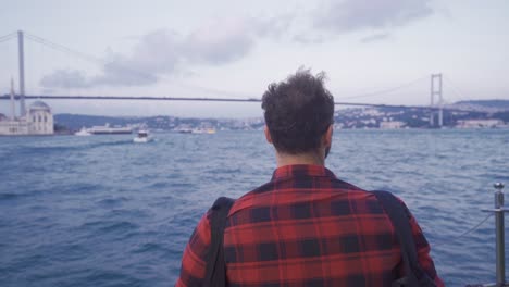 Young-man-on-the-ferry-in-Istanbul-Strait.