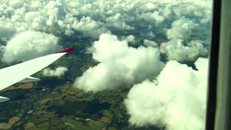 1080HD-60p,-Plane-flies-over-English-Countryside-with-clouds