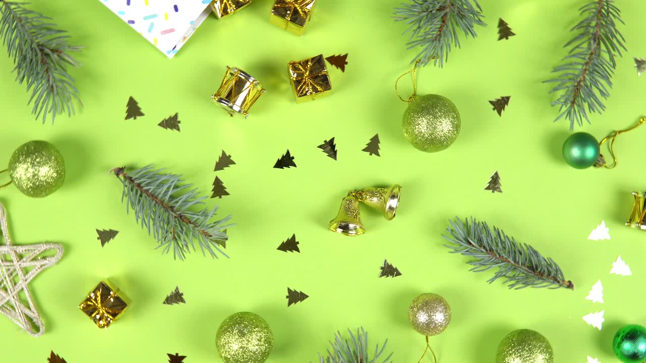 Christmas abstract pattern 360 degree rotation. Fir tree branches and gift box spinning on green background