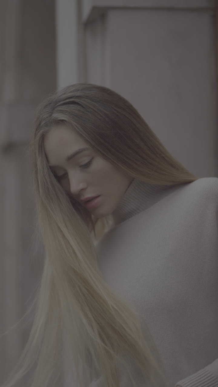 Woman in a light sweater