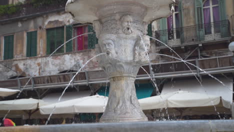 slowly passing the cansignorio sculpted base of the fountain of madonna verona, italy, slow motion