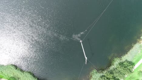 aerial drone shot of pulling system at a watersport park