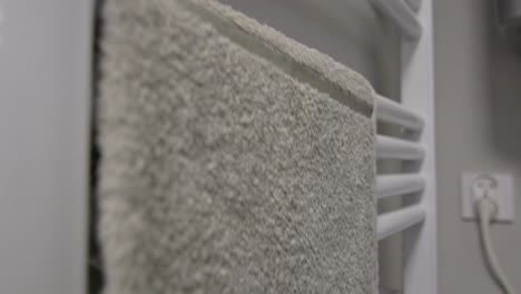 bathroom towel appearing on the heater