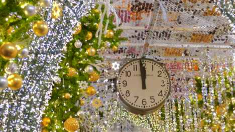 glittering christmas decor with clock at chelsea market in new york city, united states