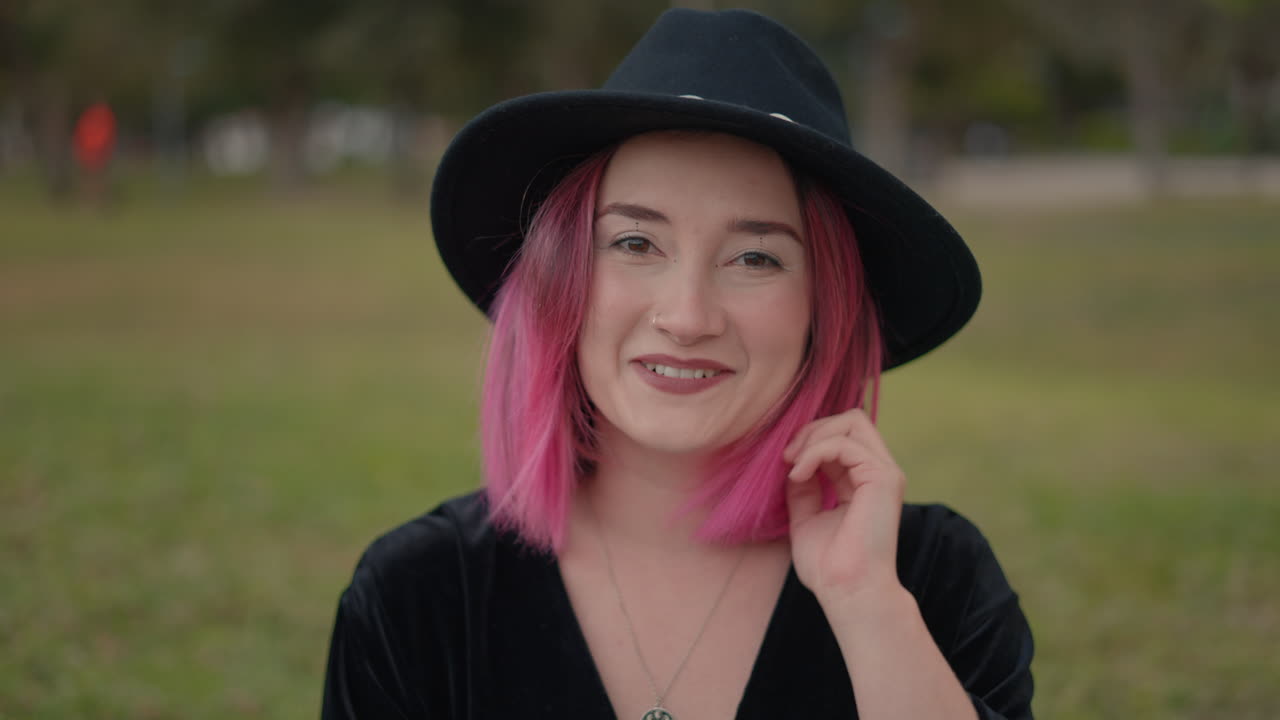 Young Woman with Pink Hair Outdoors