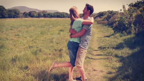 cute couple hugging in the park