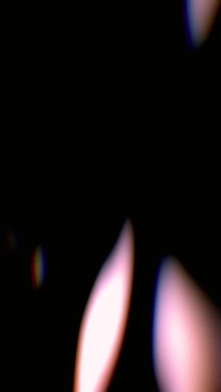 Perdite di luce astratte ed effetti luce lente su sfondo nero