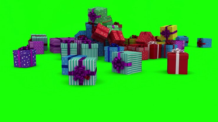 Christmas presents falling on green background
