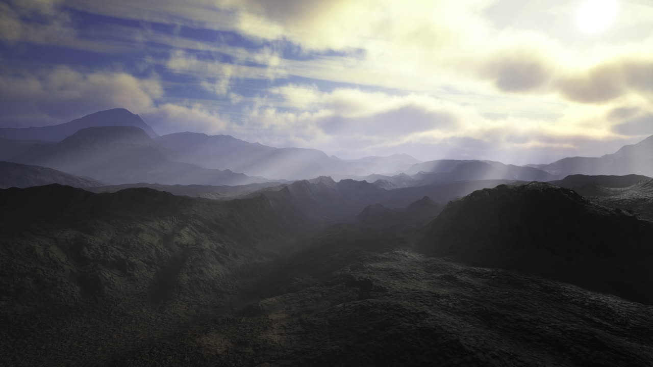 Breathtaking mountain landscape with fog and sunlight during twilight hours