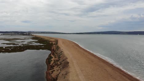 Aerial-Rising-Shot-From-Coastline-Walkway-At-Hurst-Point-At-Milford-On-Sea