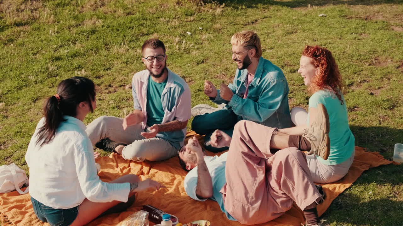 Friends Enjoying a Sunny Picnic Outdoors