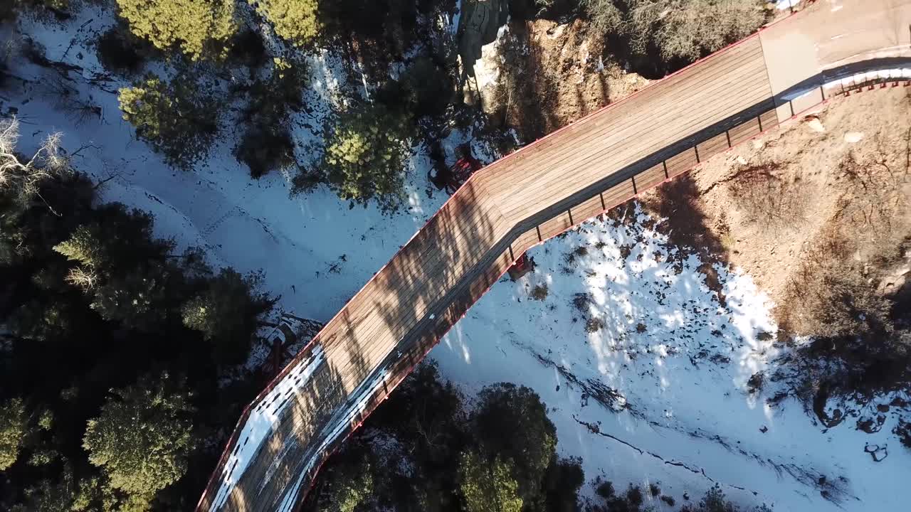 Aerial take off from bridge crossing large canyon in Colorado