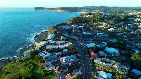 Drone-aerial-landscape-North-Avoca-headland-street-roads-residential-housing-apartment-blocks-Terrigal-coastline-Central-Coast-tourism-travel-Australia