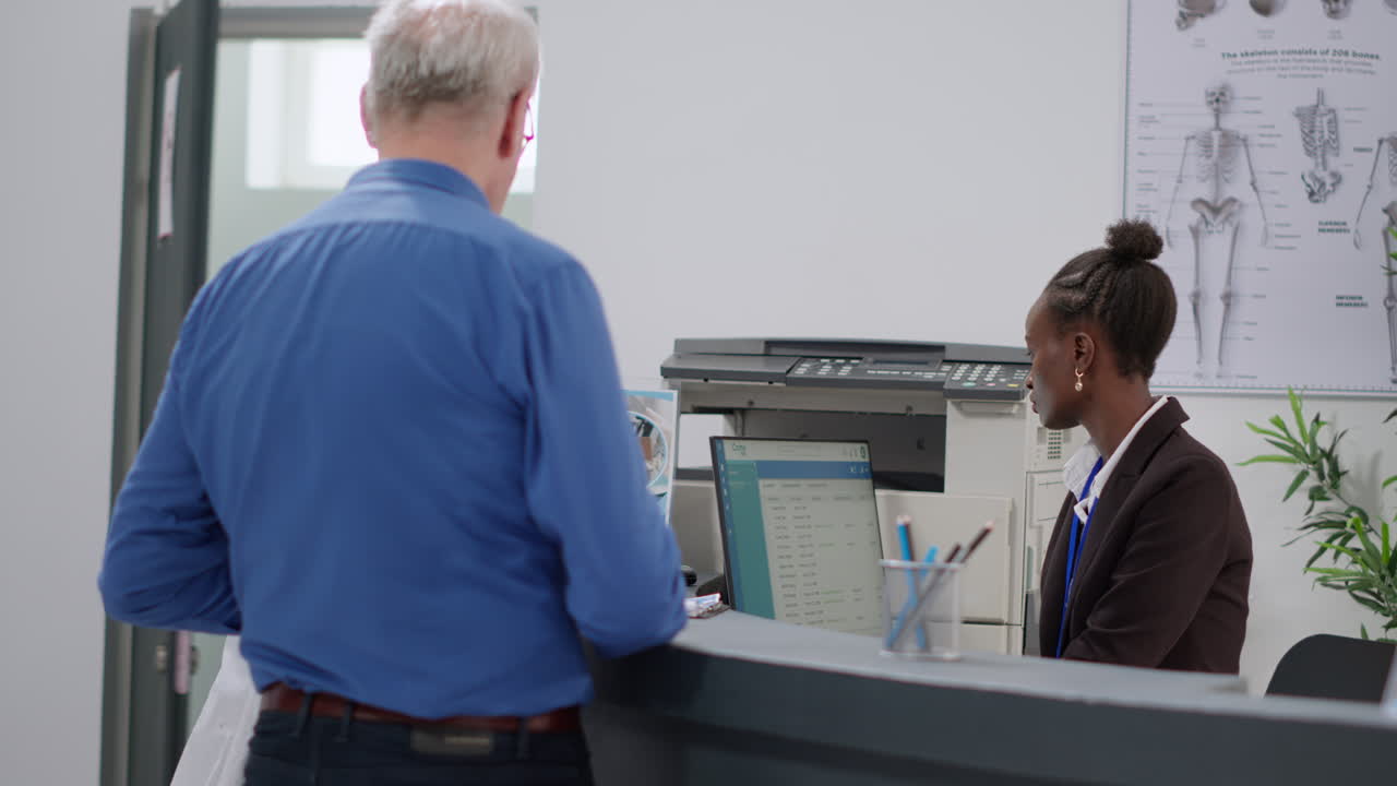 Doctor and Patient at Hospital Reception