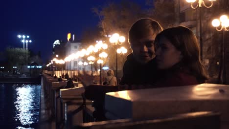 couple at night on the river