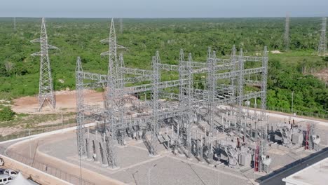 Aerial-orbiting-shot-of-ELECTRICAL-SUBSTATION,-PHOTOVOLTAIC-PARK,-CUMAYASA,-Dominican-Republic