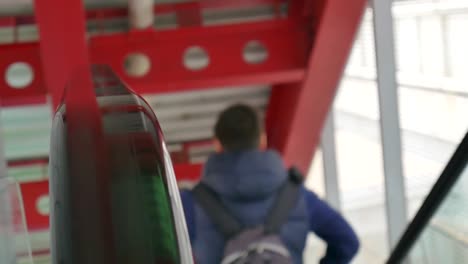 person running through the airport to catch their flight in slow motion