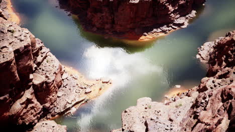 aerial view of a canyon with a river running through it