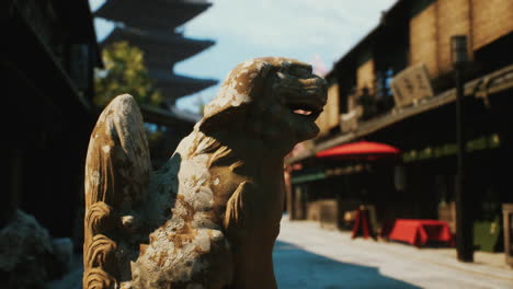 japanese stone sculpture in a traditional town