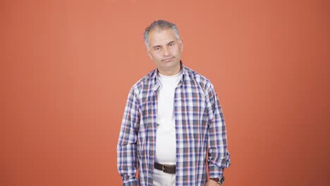 man looking depressed at camera.