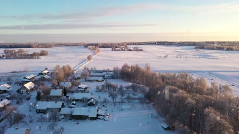 Remote-rural-village-covered-in-snow-during-snowfall