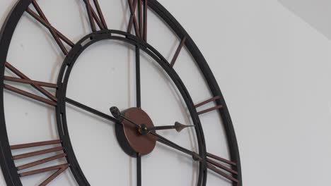 close-up - antique wall clock timelapse with sunlight