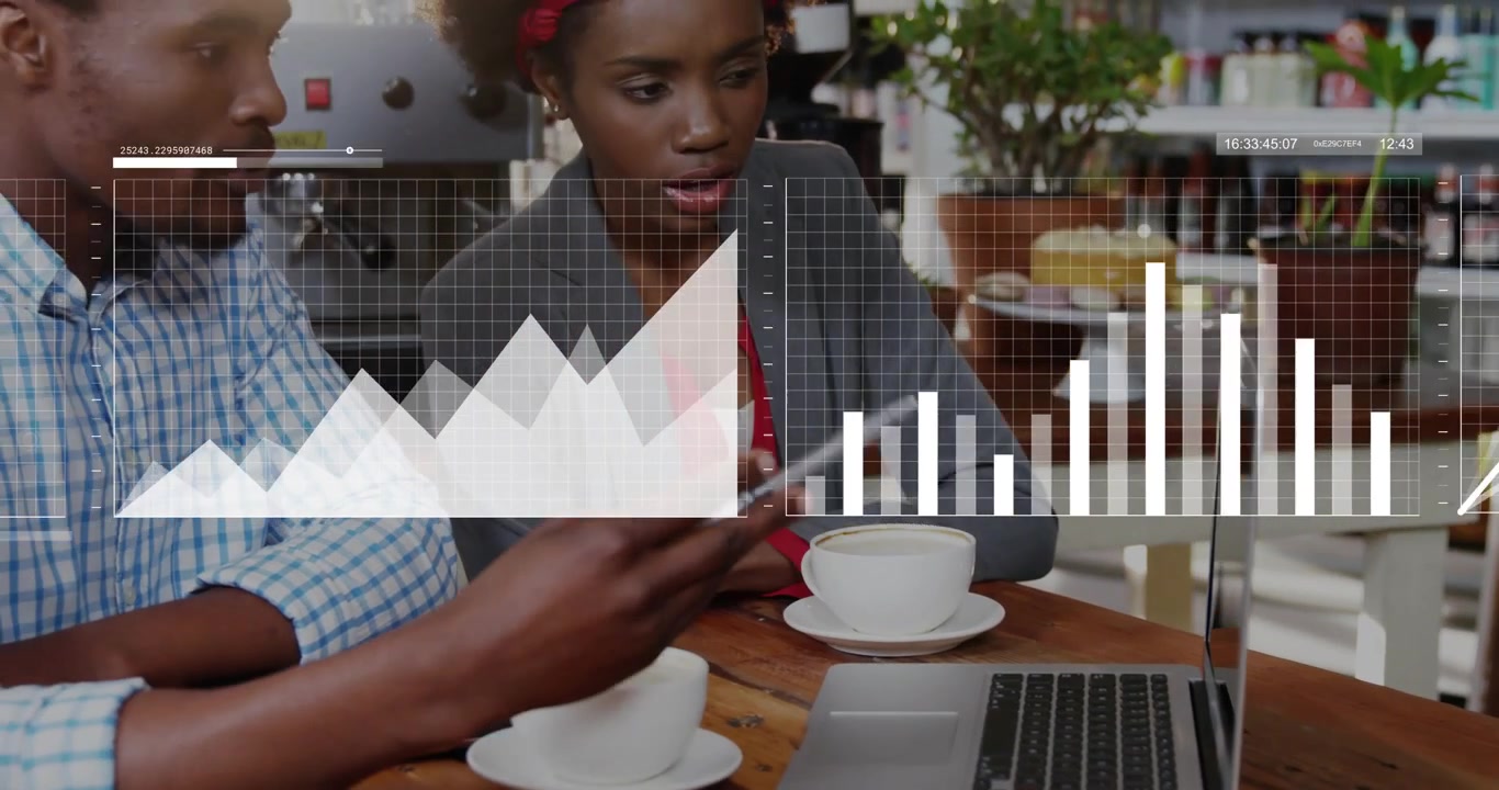 Two partners tapping phone and typing laptop analyzing business data with moving charts over laptop