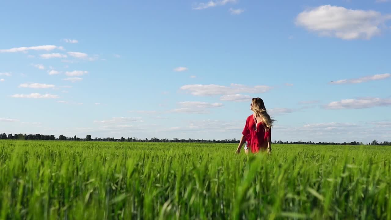 Woman Running in a Wheat Field
