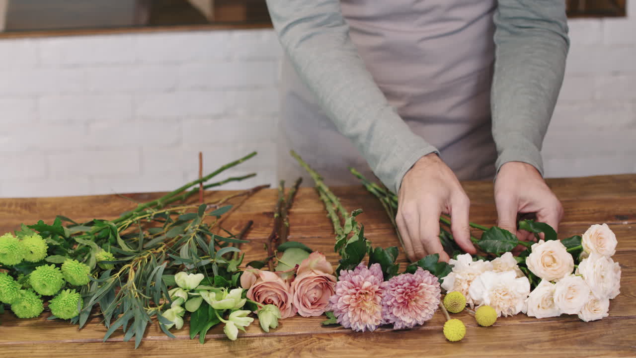 Portrait Of Senior Florist In Flower Shop