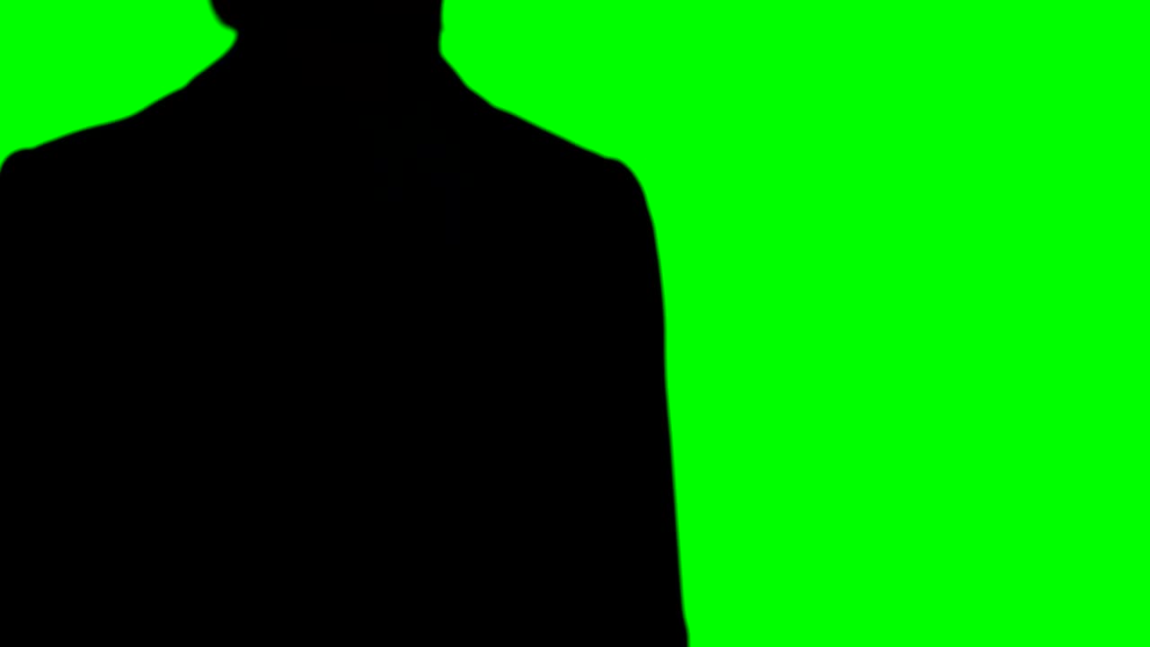 초록색 스크린 배경 에 손 을 휘두르는 여자