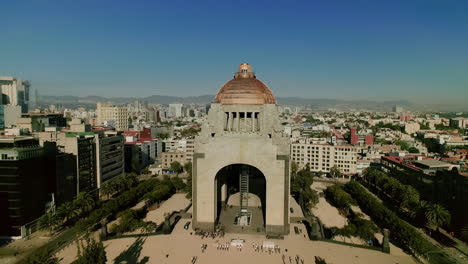 AEREAL-SHOT-OF-Monument-to-the-Revolution,-Tabacalera,-Mexico-capital-city-downtown