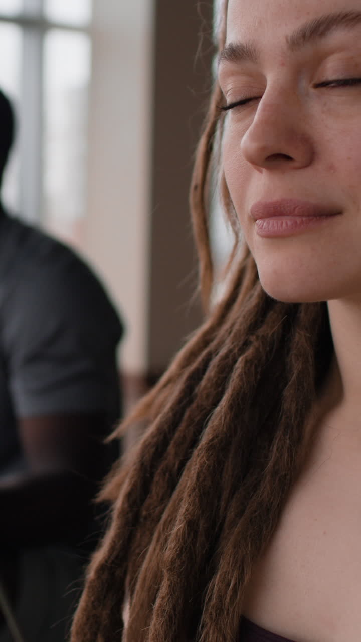 Woman meditating with incense