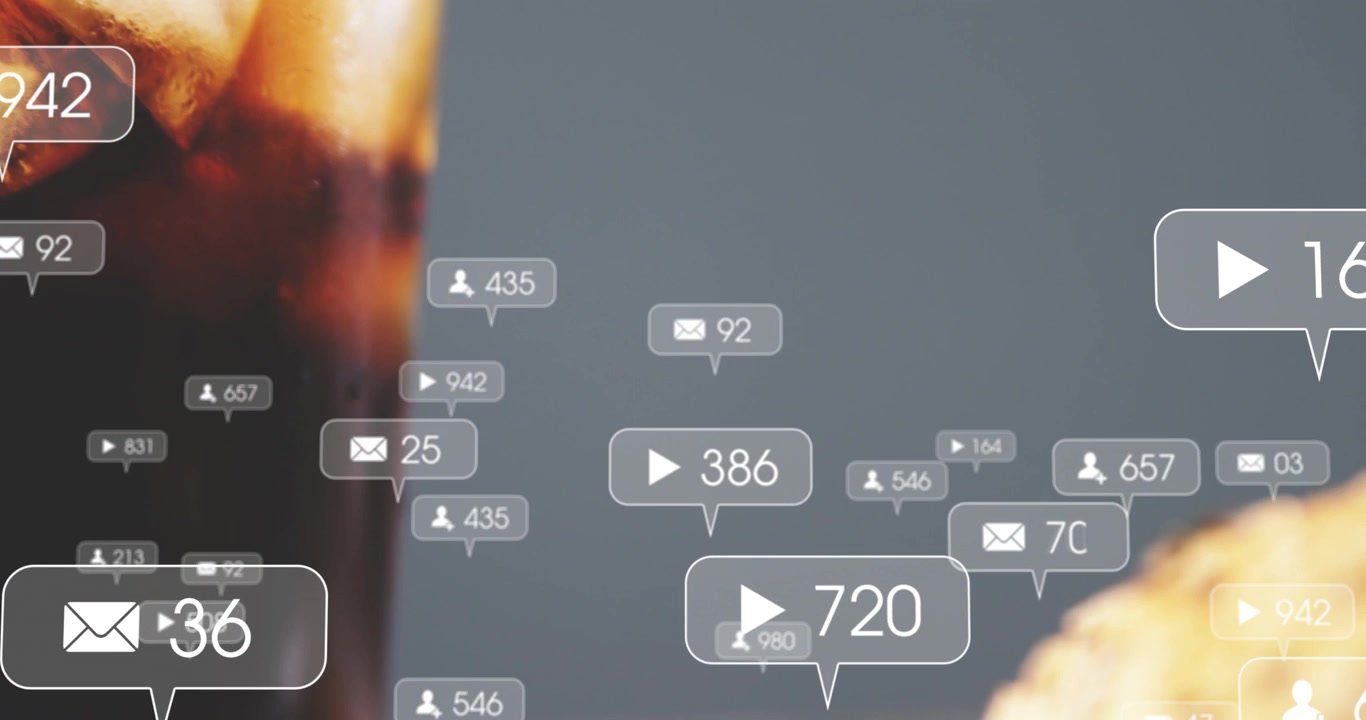 Icons appearing and floating over cola shot panning right burger taking focus boosting social reach
