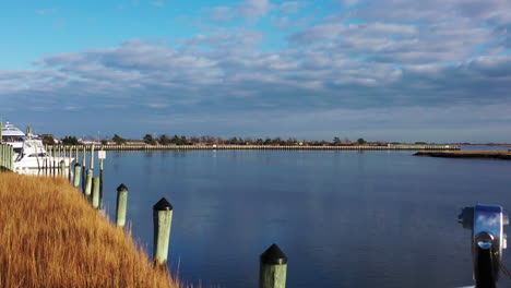 A-low-angle-shot-on-the-boardwalk,-facing-the-railings---pylons