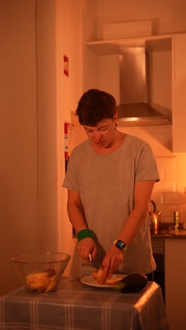 Man Preparing Vegetables in Kitchen