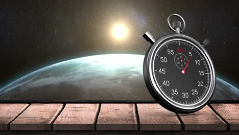 animation of stop watch over sun rising over spinning earth