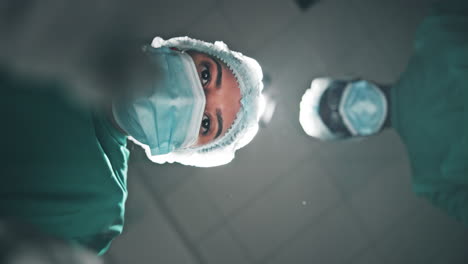 medical professional wearing surgical attire in an operating room