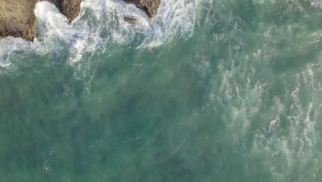 Bird's-eye-drone-reveal-shot-of-Island-edge,-Coastal-Kenya