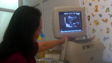 doctor performing ultrasound scan