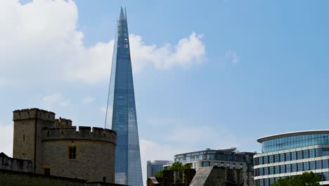 looking up to the shard from behind the tower of london, london