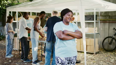 young female volunteer at food drive