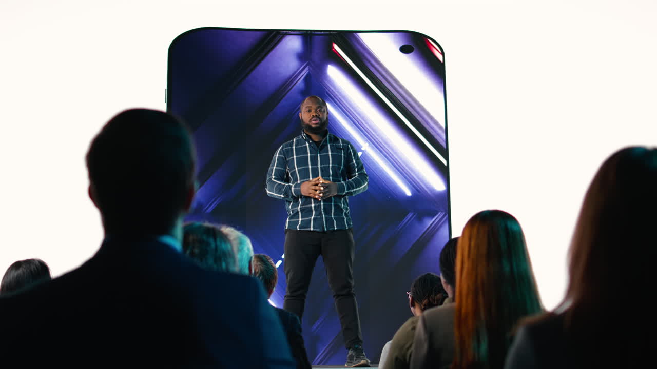 Black senior designer introduces new smartphone to participants