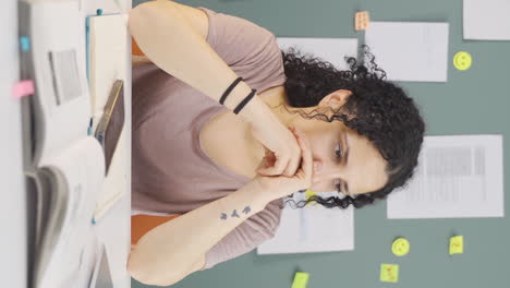 vertical video of the female student throwing the phone is angry.