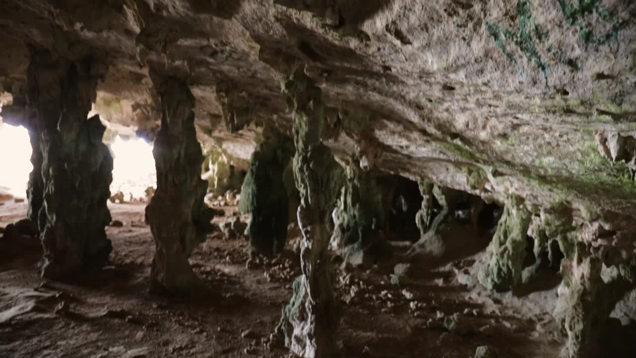 Inside a Cave with Stalactites and Stalagmites